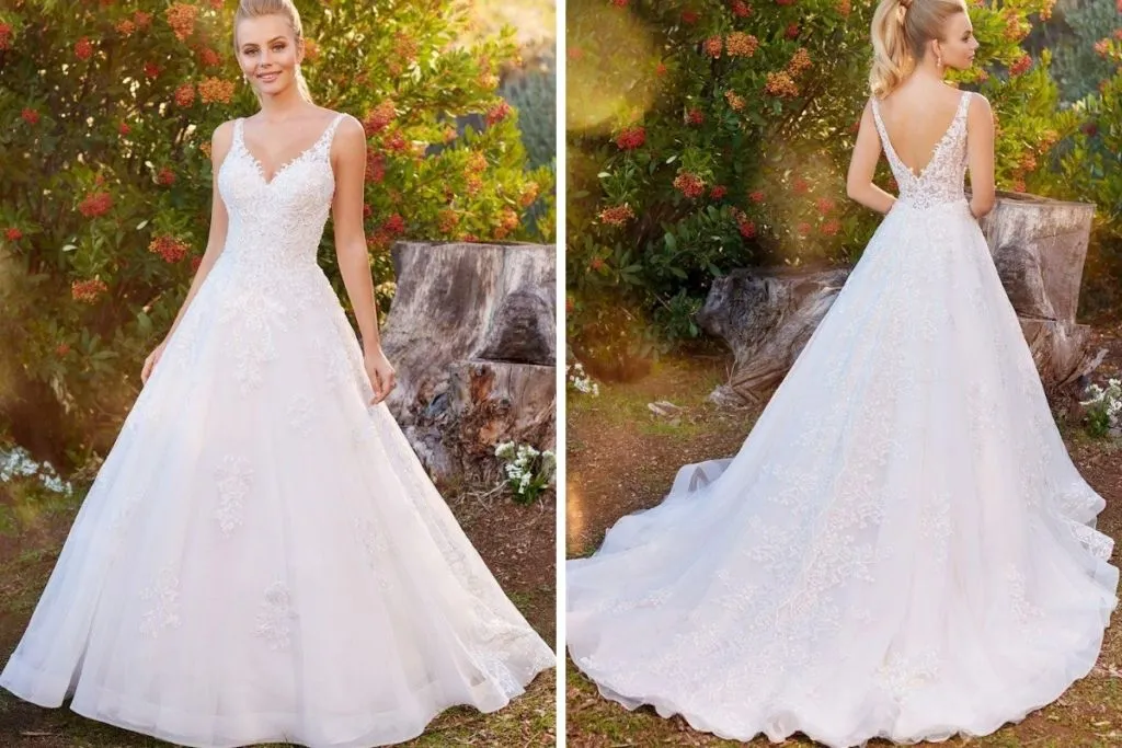 Martin Thornburg Wedding Dresses: 15 Of Our Favorites Side-by-side images showing the front and back of a bride wearing a floral lace ball gown wedding dress with a V-neckline, lace straps, and a full tulle skirt with lace appliqués, photographed outdoors in a garden setting.