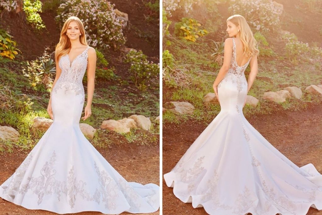 Martin Thornburg Wedding Dresses: 15 Of Our Favorites Front and back views of a lace fit-and-flare wedding dress featuring a deep V neckline, illusion bodice, open lace back, and flowing train, showcased by K&B Bridals.