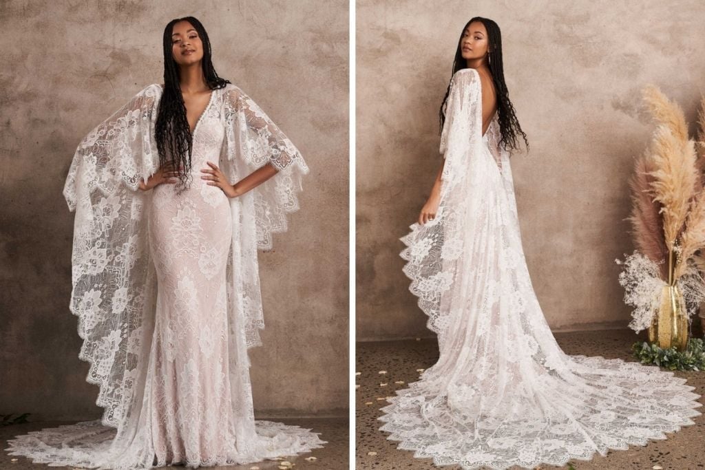 SNEAK PEEK: Lillian West 2022 Trunk Show Front and back views of a boho-inspired lace wedding dress featuring a deep V neckline, dramatic lace cape sleeves, an open back, and a flowing scalloped lace train, available at K&B Bridals.