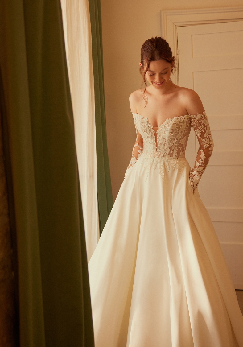 Long Sleeve Off-the-Shoulder Satin Ball Gown Bella Adore by Justin Alexander wedding dresses frederick maryland