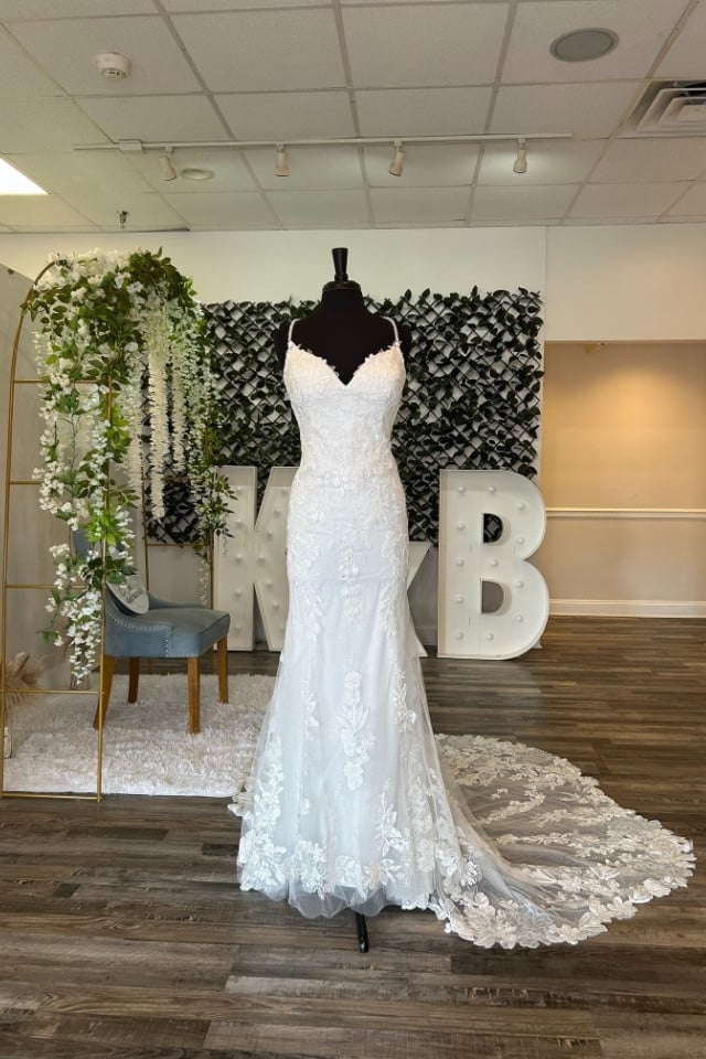 Page Updates & Announcements Floral lace wedding gown with spaghetti straps and sheer lace train