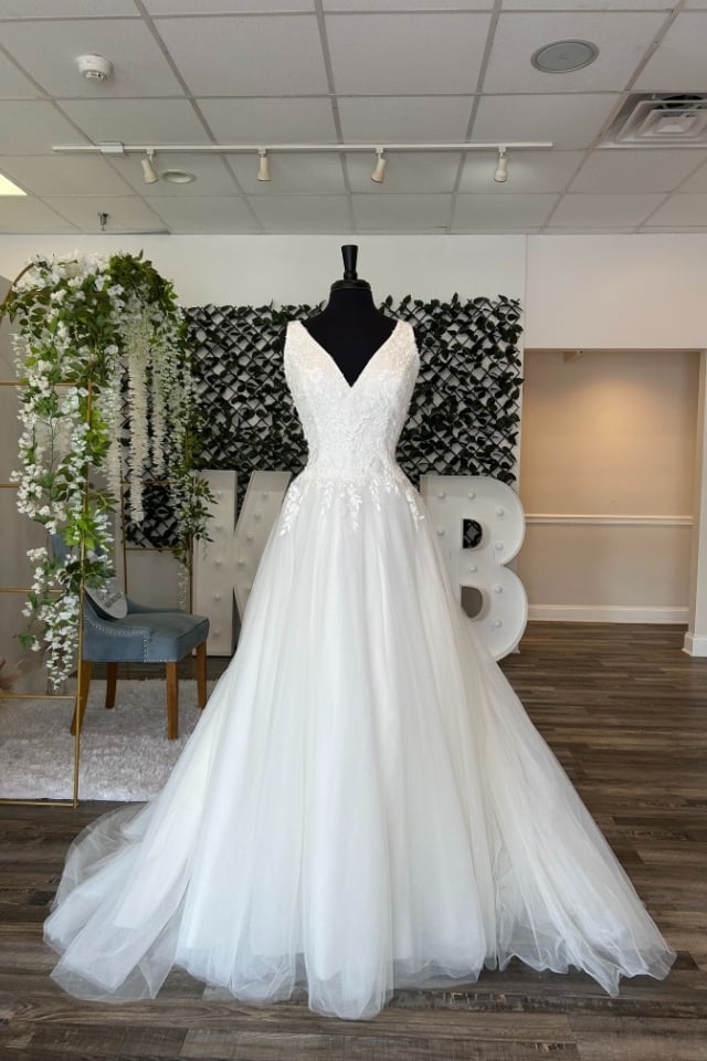 Tulle ballgown wedding dress with lace bodice and V-neckline
