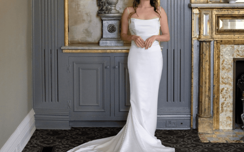  bride wearing a charmeuse fabric wedding dress