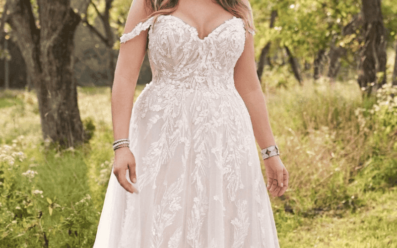 bride wearing a lace fabric wedding dress
