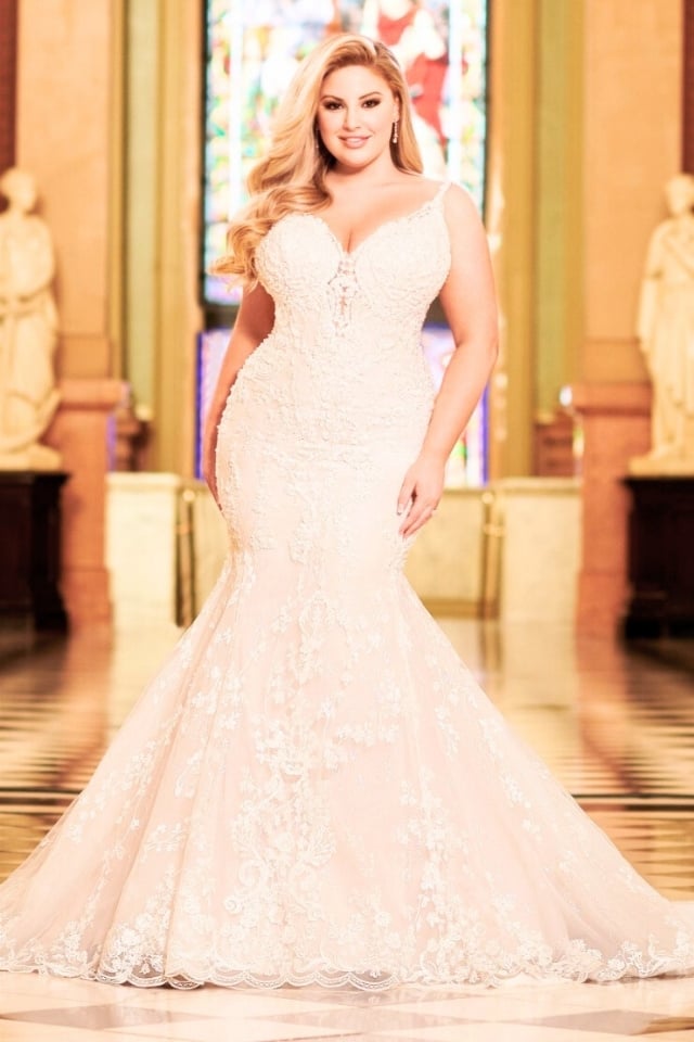 Lace mermaid wedding dress with sweetheart neckline and long train.