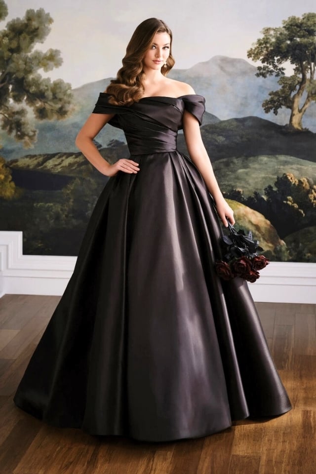 Off-Shoulder Mikado Ball Gown Wedding Dress Wren MT8112 Bride in off-shoulder Mikado ball gown with ruched bodice and full pleated skirt in Black, standing against a vintage landscape mural backdrop.