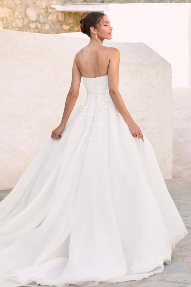 Strapless Scoop Neck Ball Gown Wedding Dress Joy Y3195 Strapless scoop neckline ball gown with lace bodice and full organza skirt.