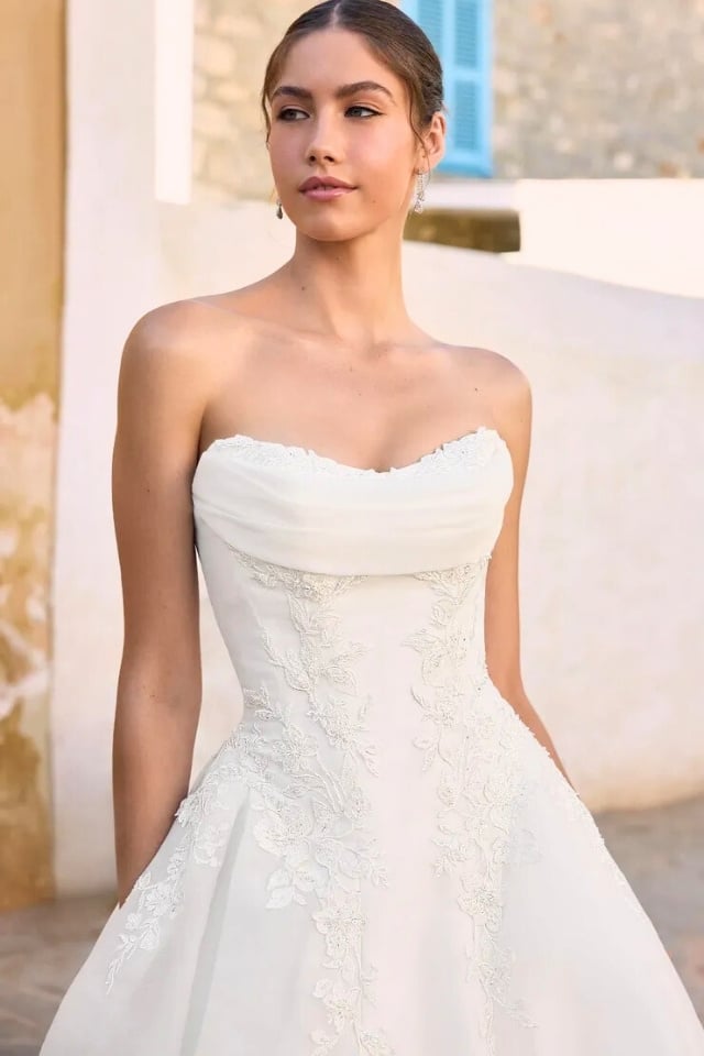 Strapless Scoop Neck Ball Gown Wedding Dress Joy Y3195 Strapless scoop neckline ball gown with lace bodice and full organza skirt.