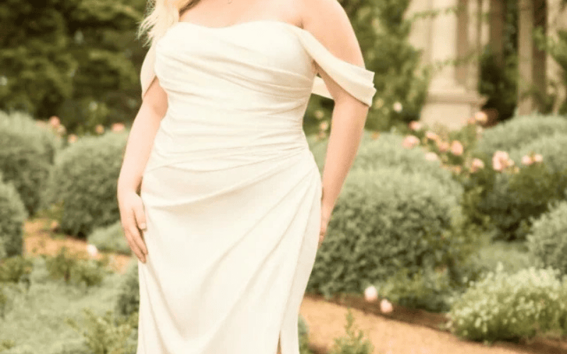 8 Stunning Wedding Dress Fabrics and How to Choose Yours bride wearing a crepe wedding dress