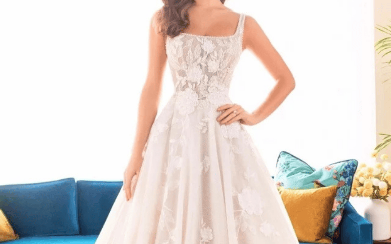 8 Stunning Wedding Dress Fabrics and How to Choose Yours bride wearing a tulle wedding dress