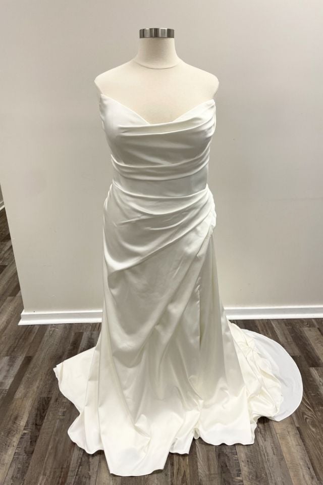 Satin fit and flare wedding dress with draped cowl neckline and flattering ruched bodice.