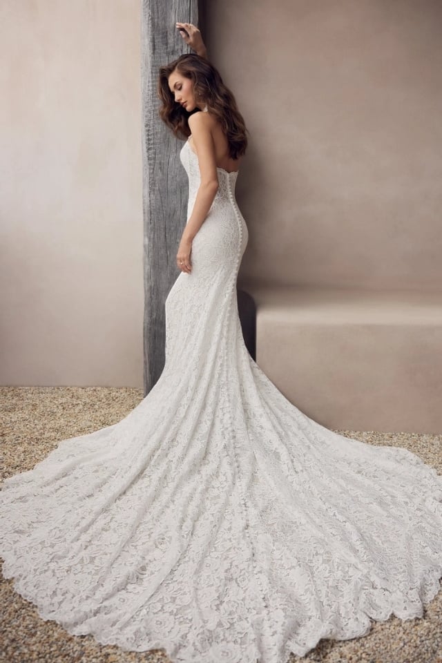 High Neck Lace Fit-and-Flare Wedding Dress Penelope | Style Y3249 High neck lace fit-and-flare wedding dress with detachable lace gauntlet sleeves and dramatic train by Sophia Tolli, style Y3249.