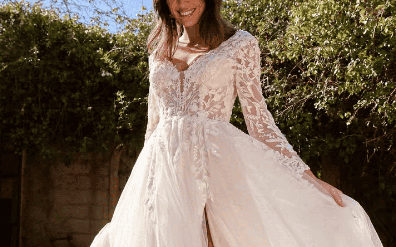 Winter Wedding Dress Ideas: Long Sleeves, Luxe Fabrics, and Cozy Details bride wearing long-sleeves