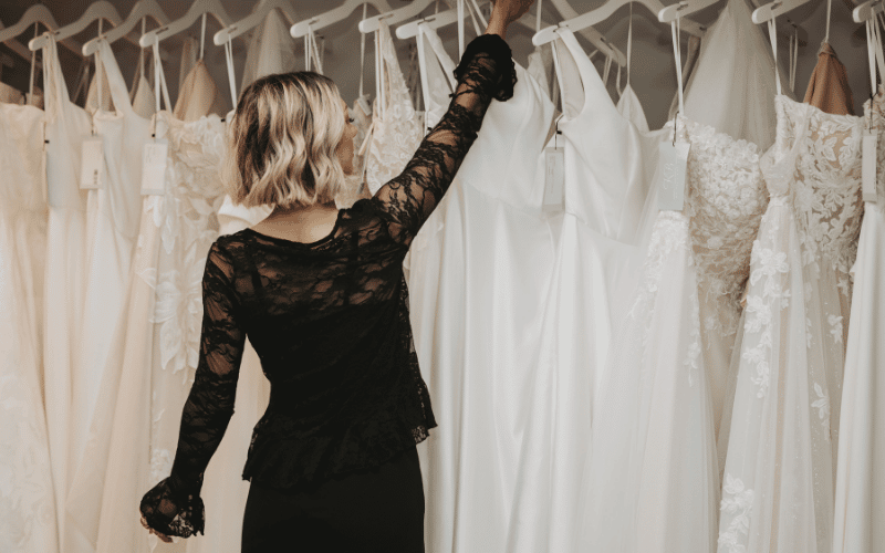 Wedding Dress Questions to Ask Your Stylist During Your Appointment stylist looking for wedding gown