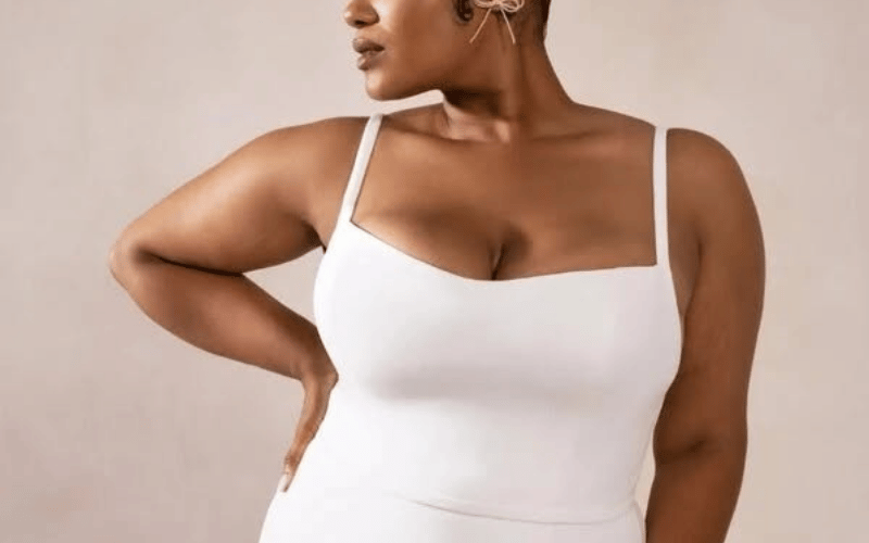 A Square Neckline Wedding Dress Might Be the Detail You Didn’t Know You Wanted woman wearing a wedding dress with square neckline