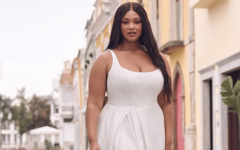 A Square Neckline Wedding Dress Might Be the Detail You Didn’t Know You Wanted woman wearing a wedding dress with square neckline