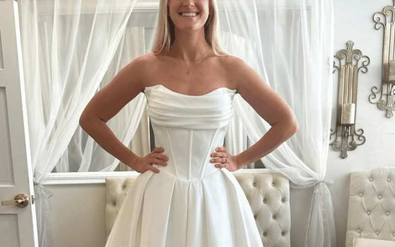 Why the Wedding Dress with Corset Bodice Is Having a Bridal Moment Wedding Dress with Corset Bodice, woman wearing satin wedding dress
