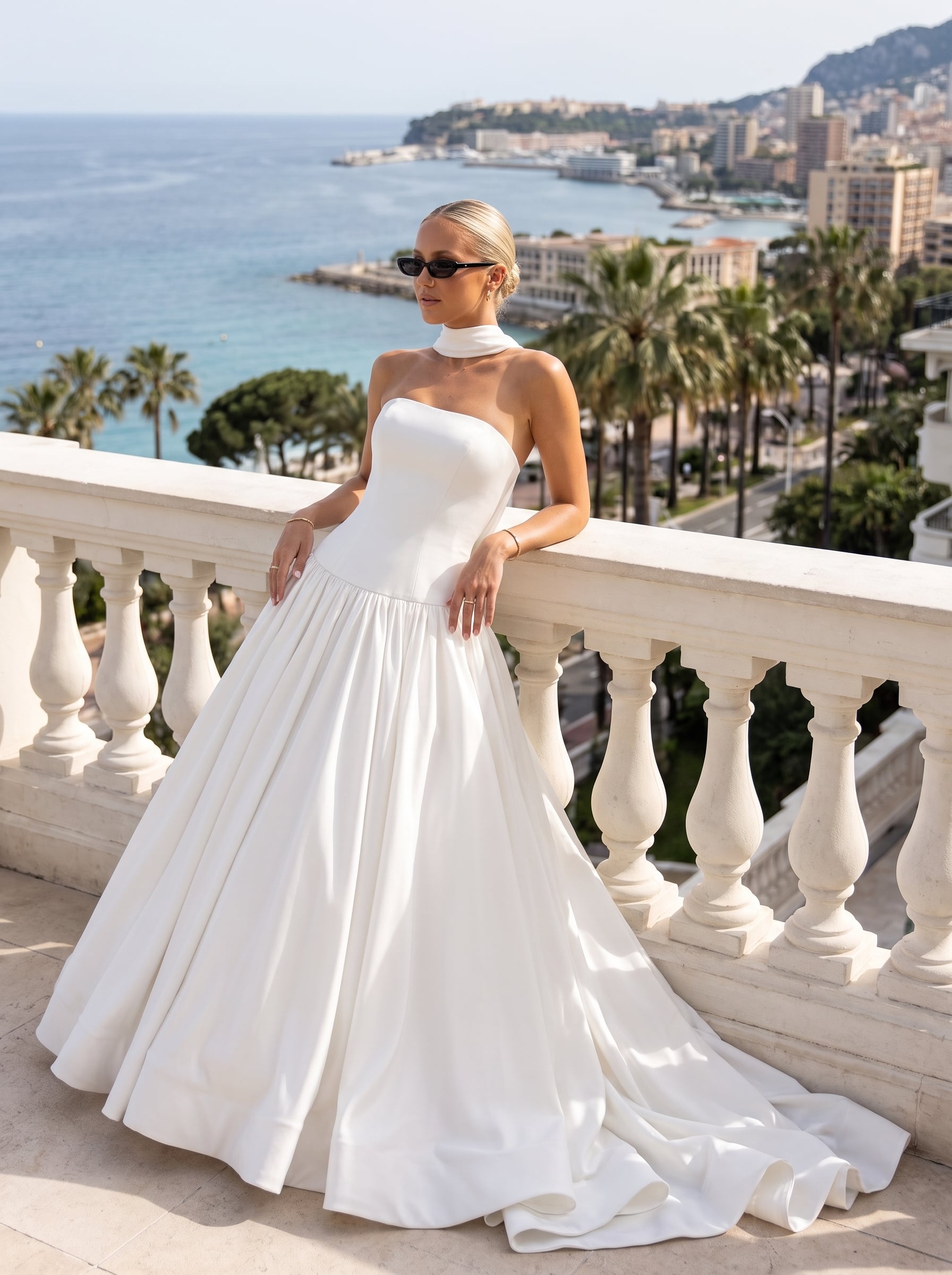 Strapless matte satin ball gown wedding dress with a sculpted asymmetric neckline, drop waist, full gathered skirt, and sweeping train.